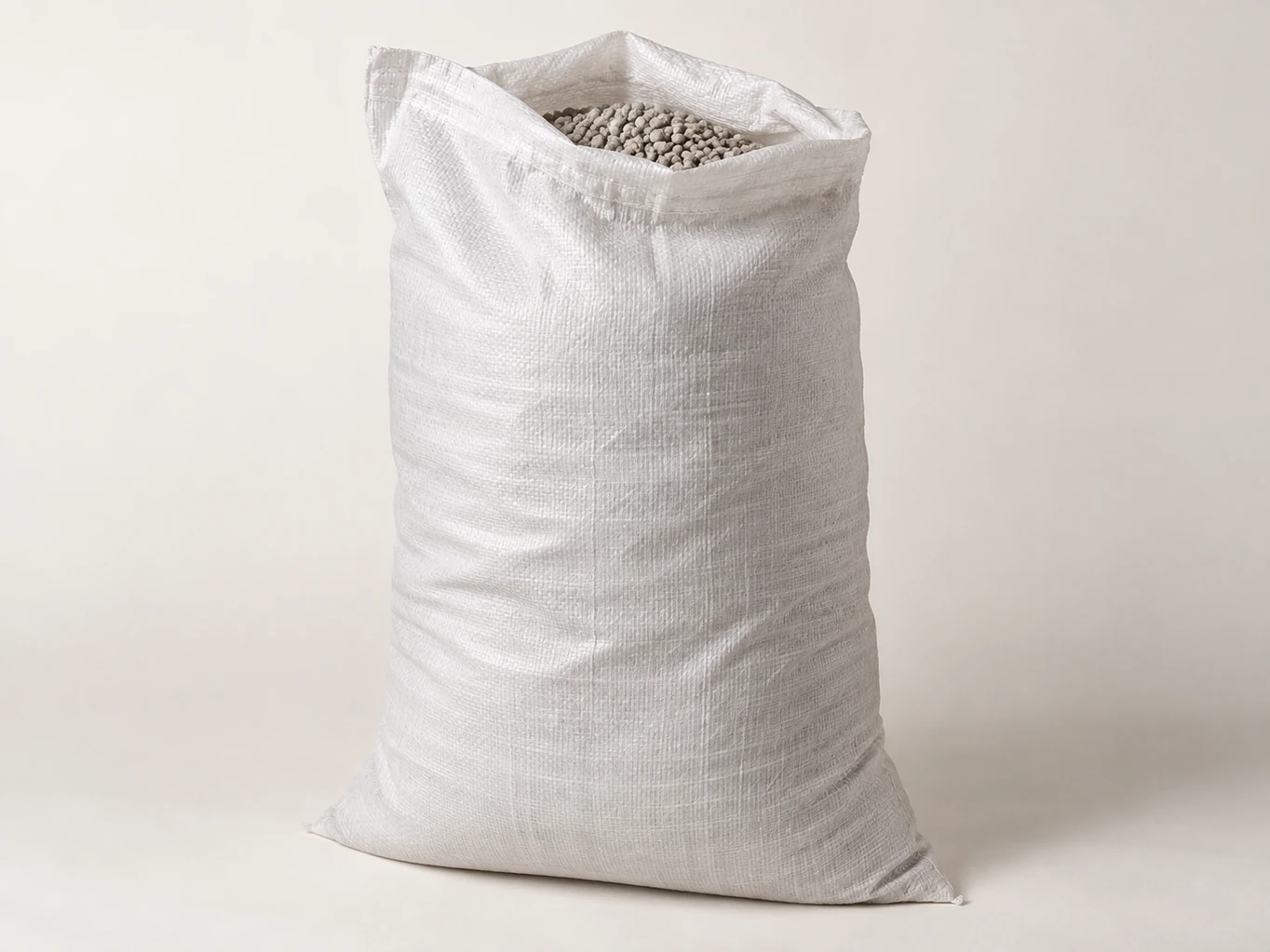 Illustrative large industrial material sack and pellets
